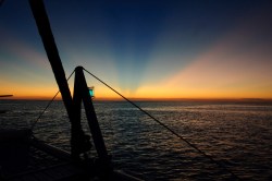 sunrise on water by Jack H Thompson